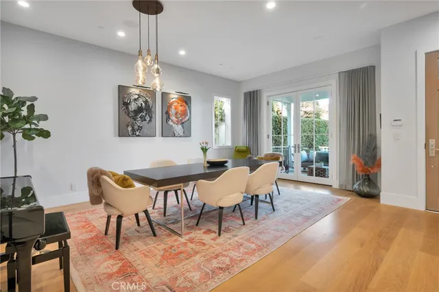 a living room with fireplace furniture and a flat screen tv