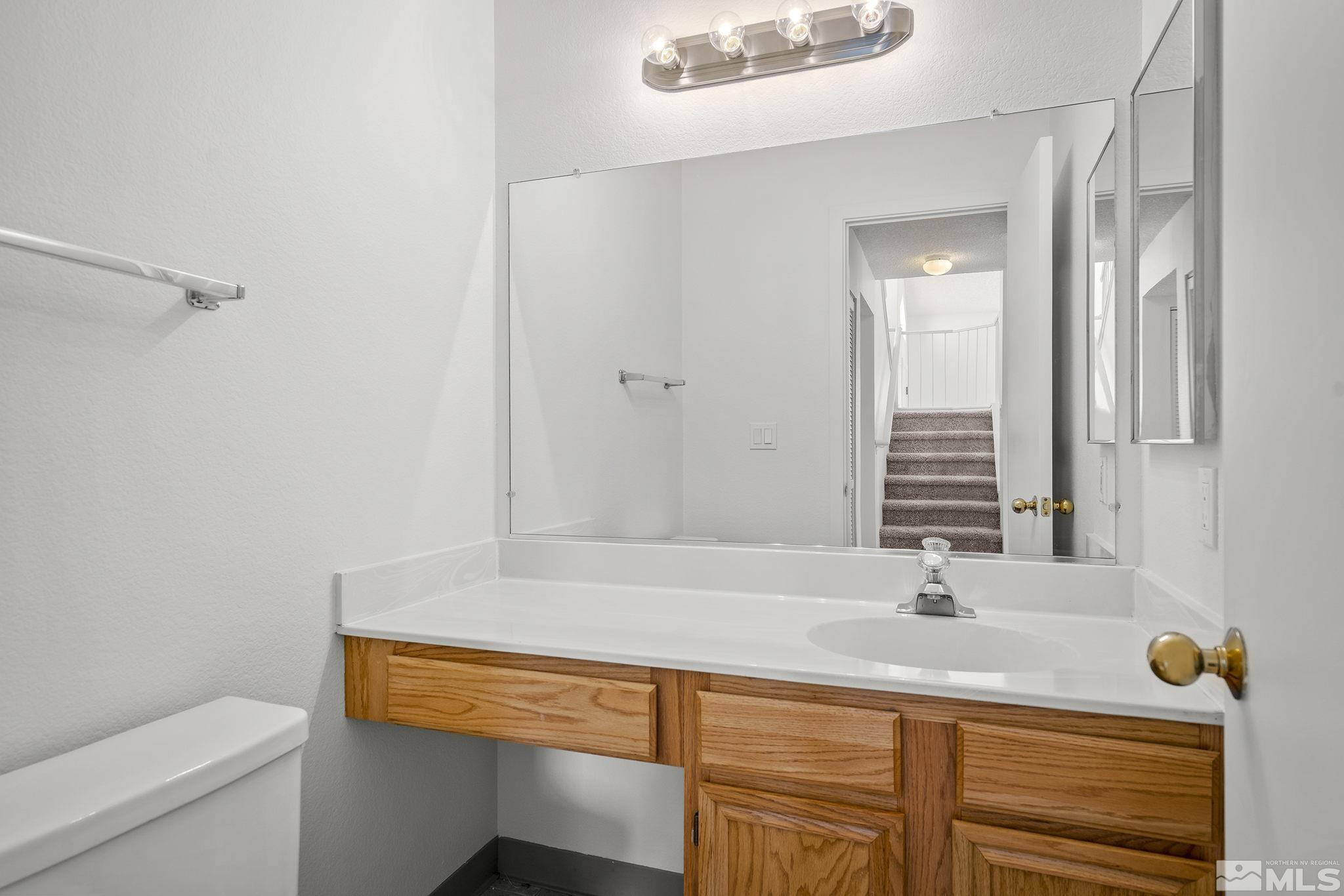 1178 Backer Way Reno, NV 89523 - Photo 10 of 39 a bathroom with a sink and a toilet