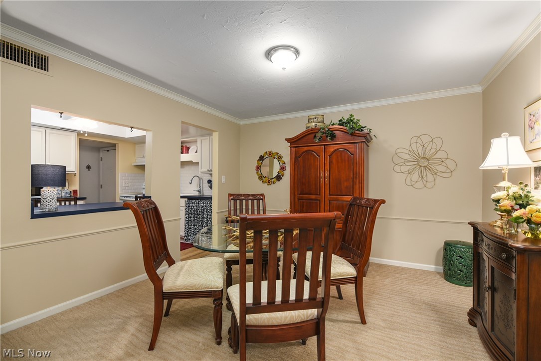 22701 Center Ridge Road, Unit 206 Rocky River, OH 44116 - Photo 11 of 30 Oversized dining room w/ kitchen access