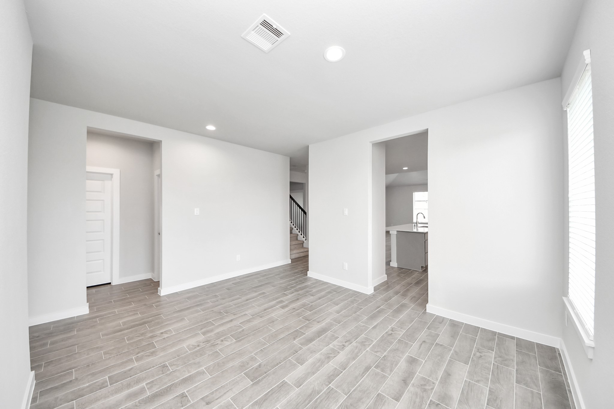 24502 Broad Park Spring, TX 77373 - Photo 12 of 47 Make memories gathered around the table with your family and friends! This spacious dining room features elegant flooring, custom paint, and adjacent to family room and kitchen for open concept feel.