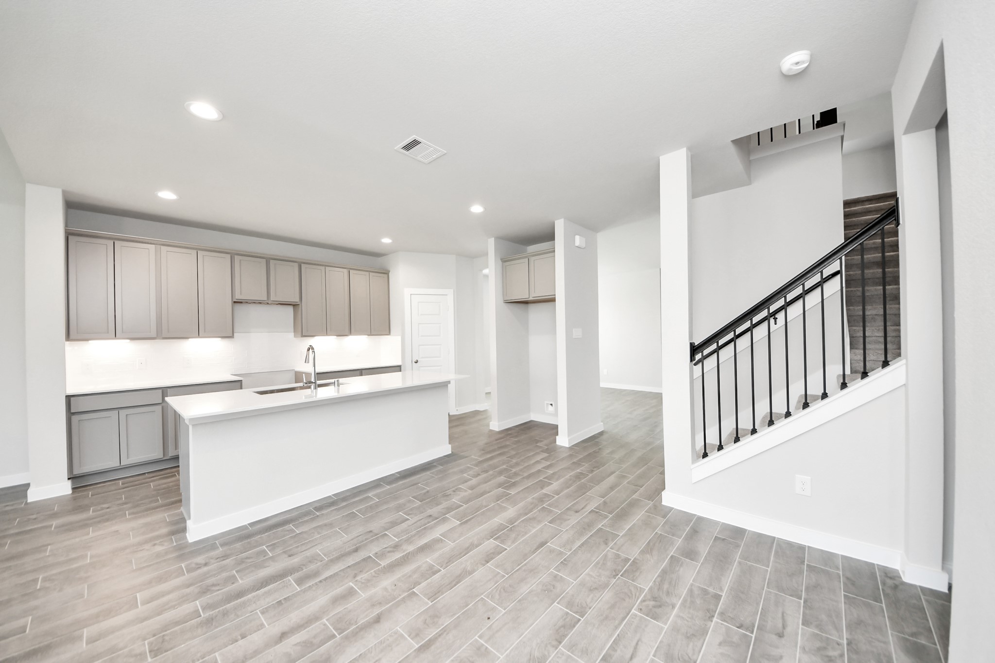 24502 Broad Park Spring, TX 77373 - Photo 22 of 47 All of this overlooks your expansive family room, creating a perfect space for culinary delights and family gatherings.