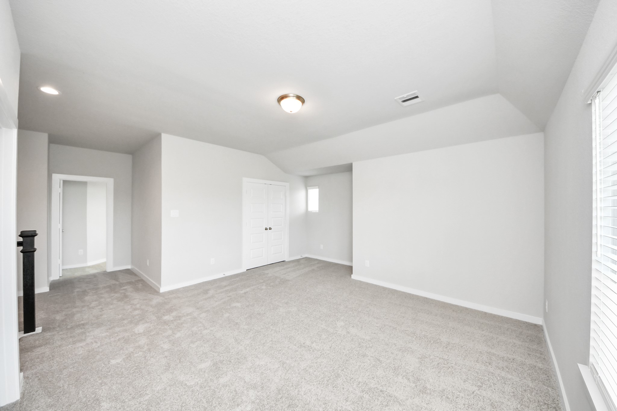 24502 Broad Park Spring, TX 77373 - Photo 33 of 47 Come upstairs and enjoy a day of leisure in this fabulous game room! This is the perfect hangout spot or adult game room! Features plush carpet, high ceilings, custom paint and windows for plenty of natural light.