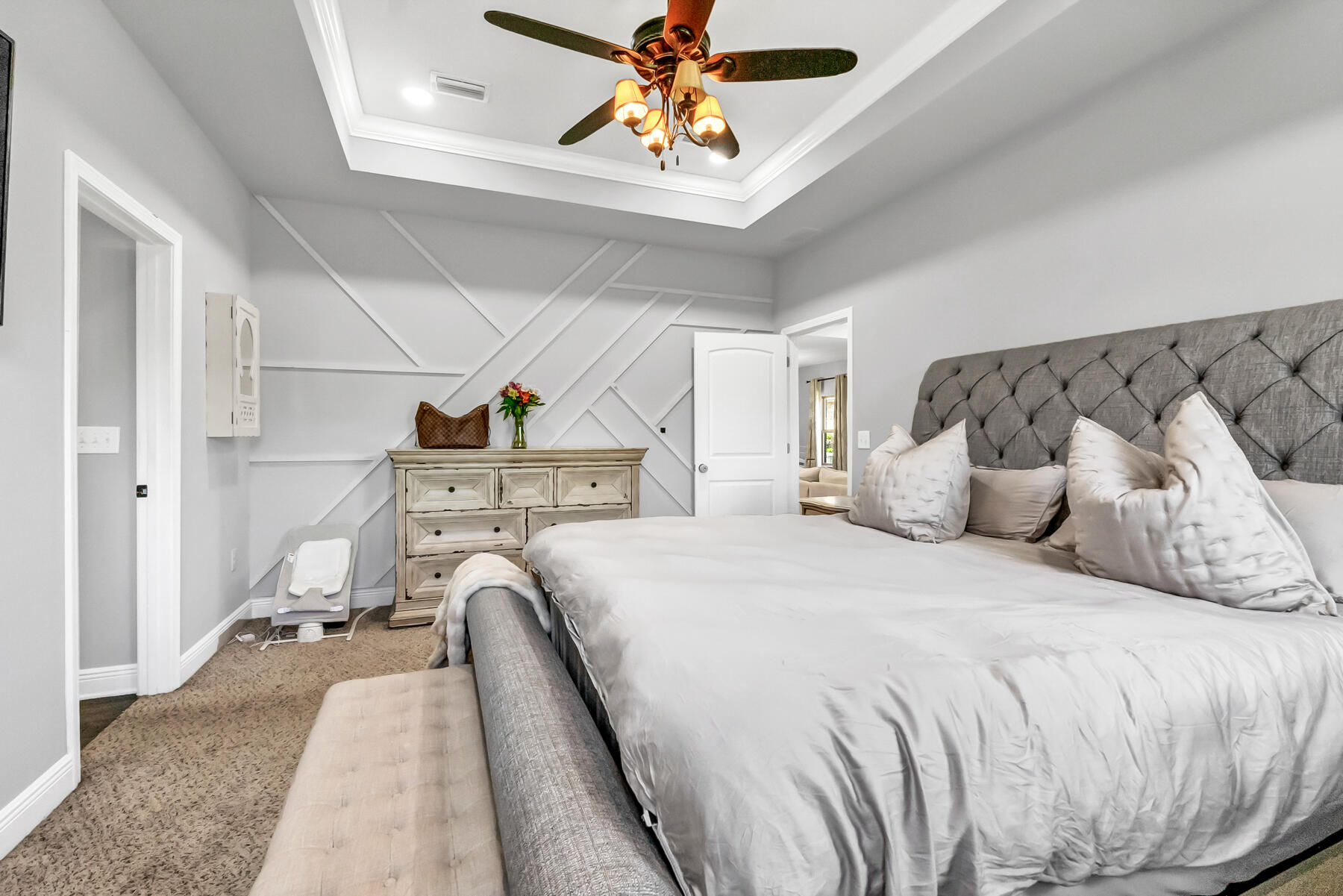 682 Teal Street Crestview, FL 32539 - Photo 15 of 34 a bedroom with bed and window