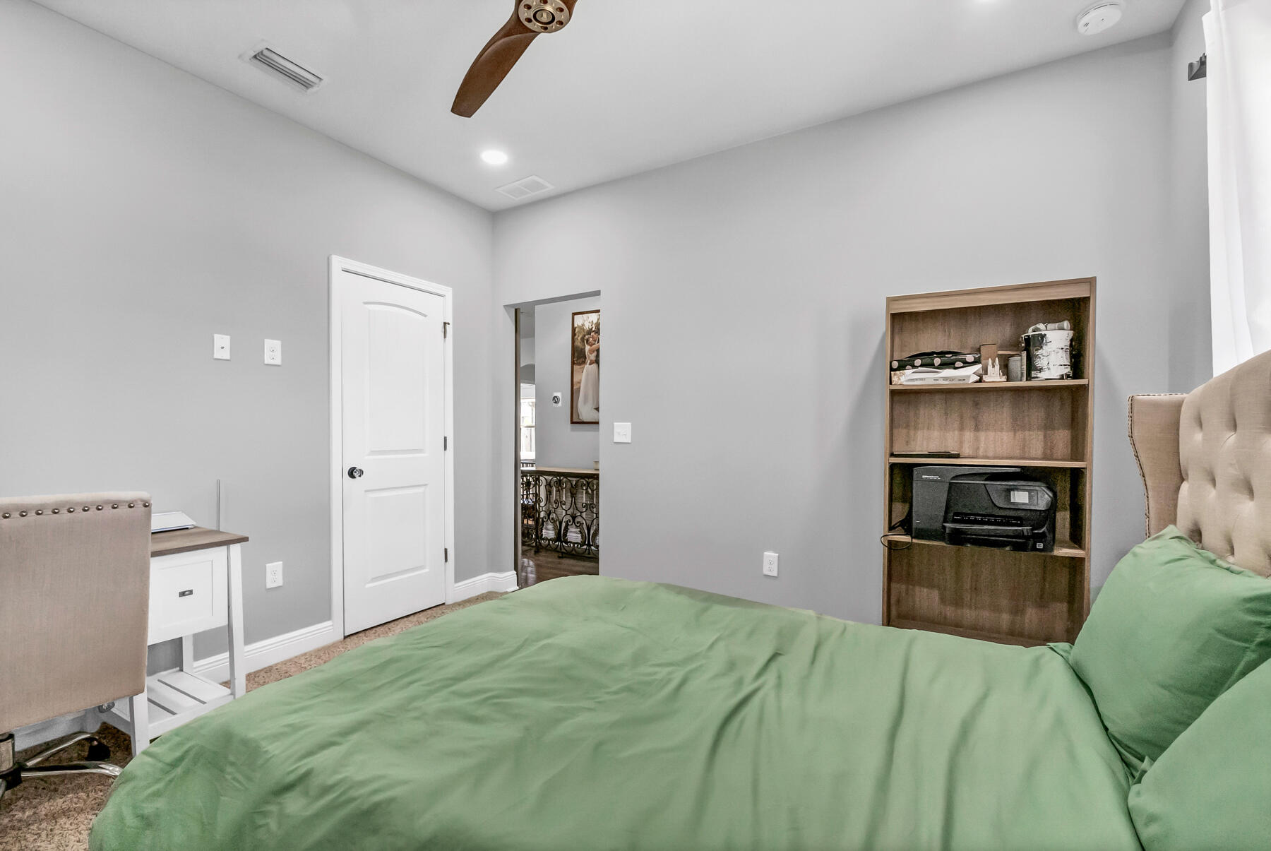 682 Teal Street Crestview, FL 32539 - Photo 17 of 34 a bedroom with a bed and furniture