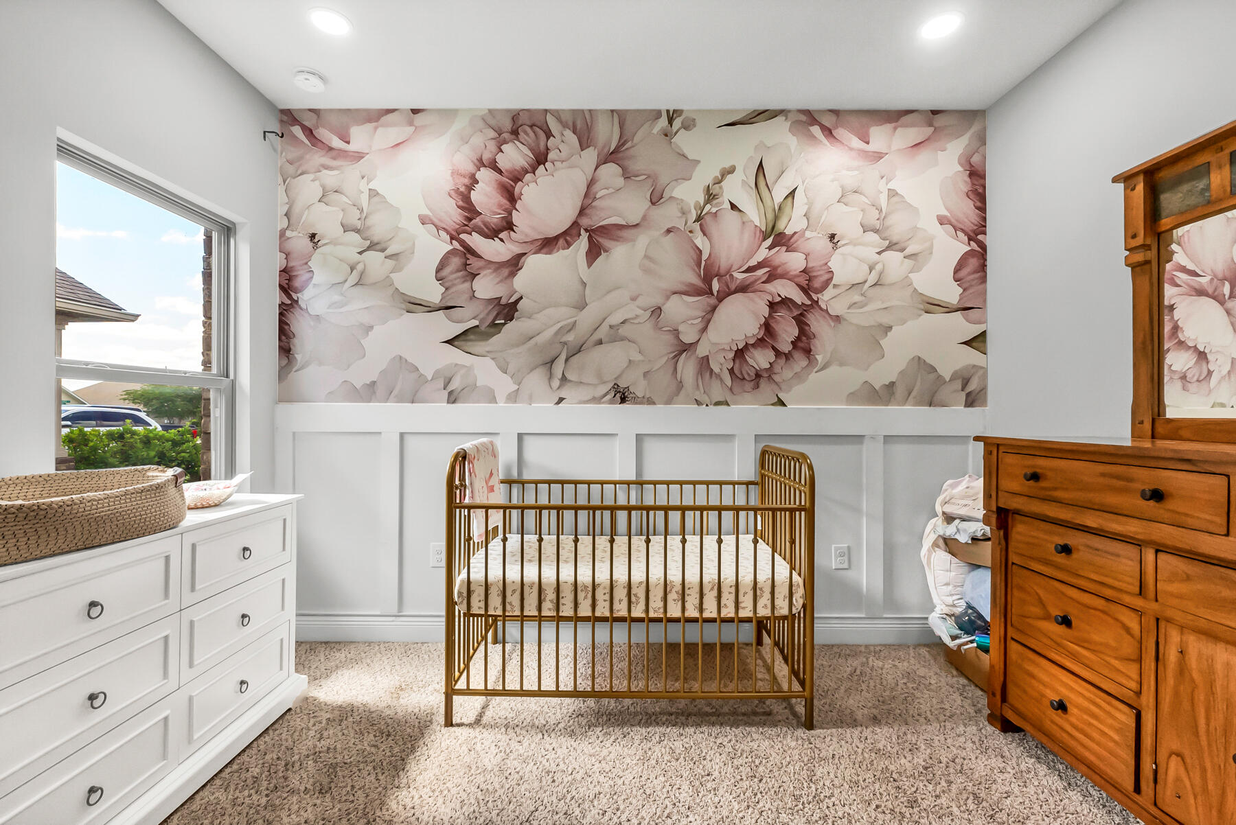 682 Teal Street Crestview, FL 32539 - Photo 19 of 34 a bedroom with a bed and a window