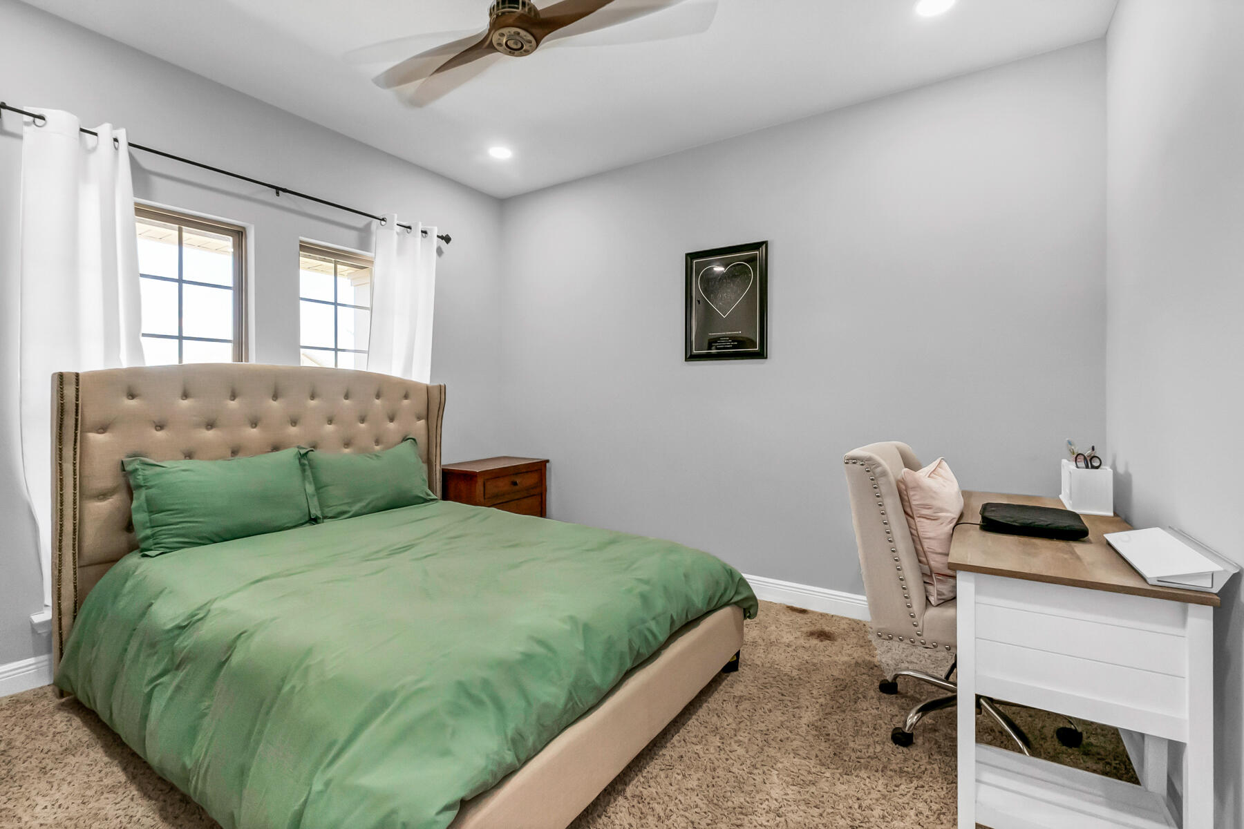 682 Teal Street Crestview, FL 32539 - Photo 20 of 34 a bedroom with a bed a computer on a desk and chair