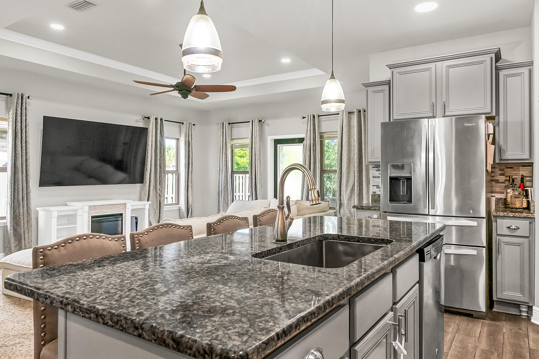 682 Teal Street Crestview, FL 32539 - Photo 2 of 34 a kitchen with stainless steel appliances granite countertop a sink a refrigerator and a granite counter tops