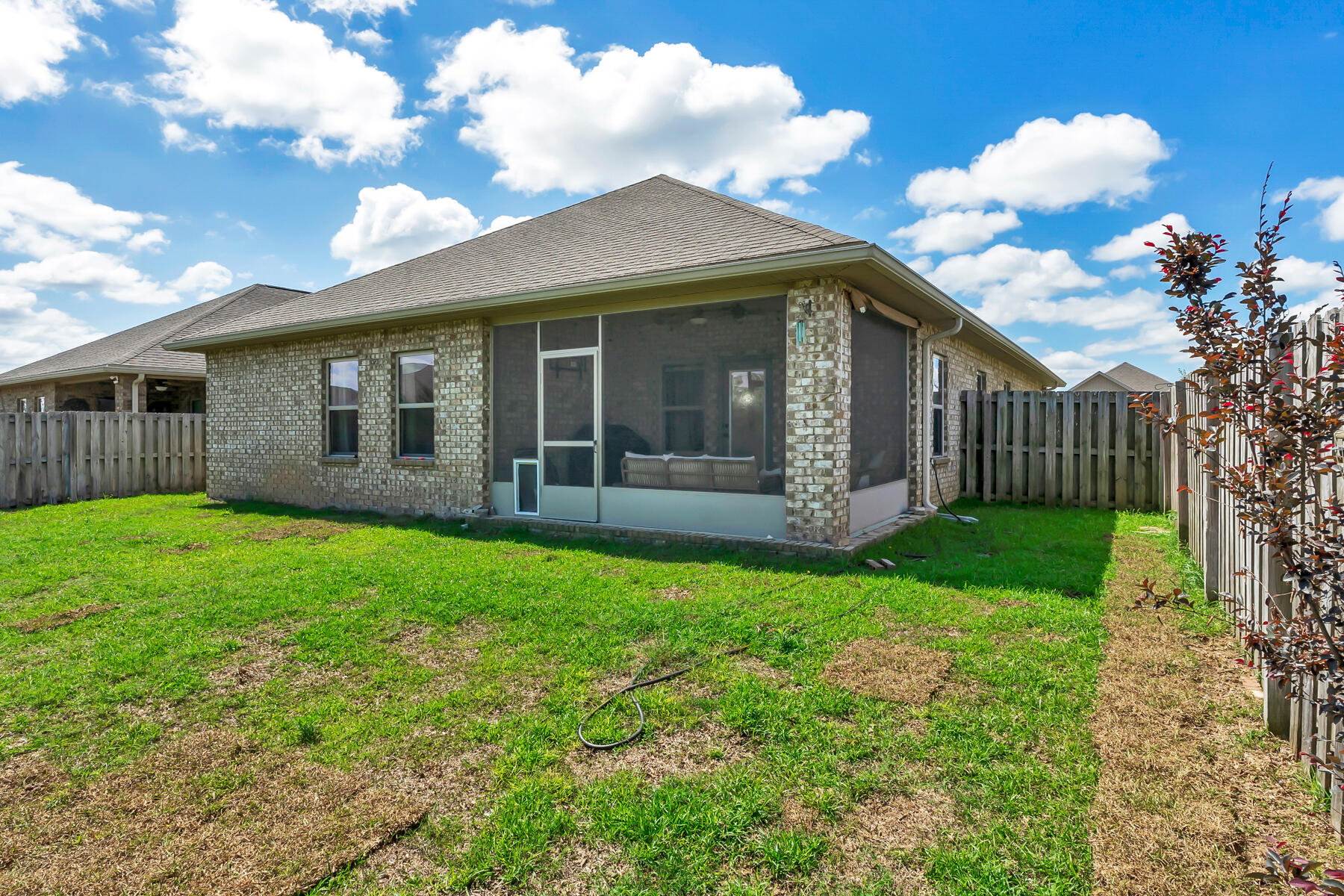 682 Teal Street Crestview, FL 32539 - Photo 30 of 34 a view of a house with garden