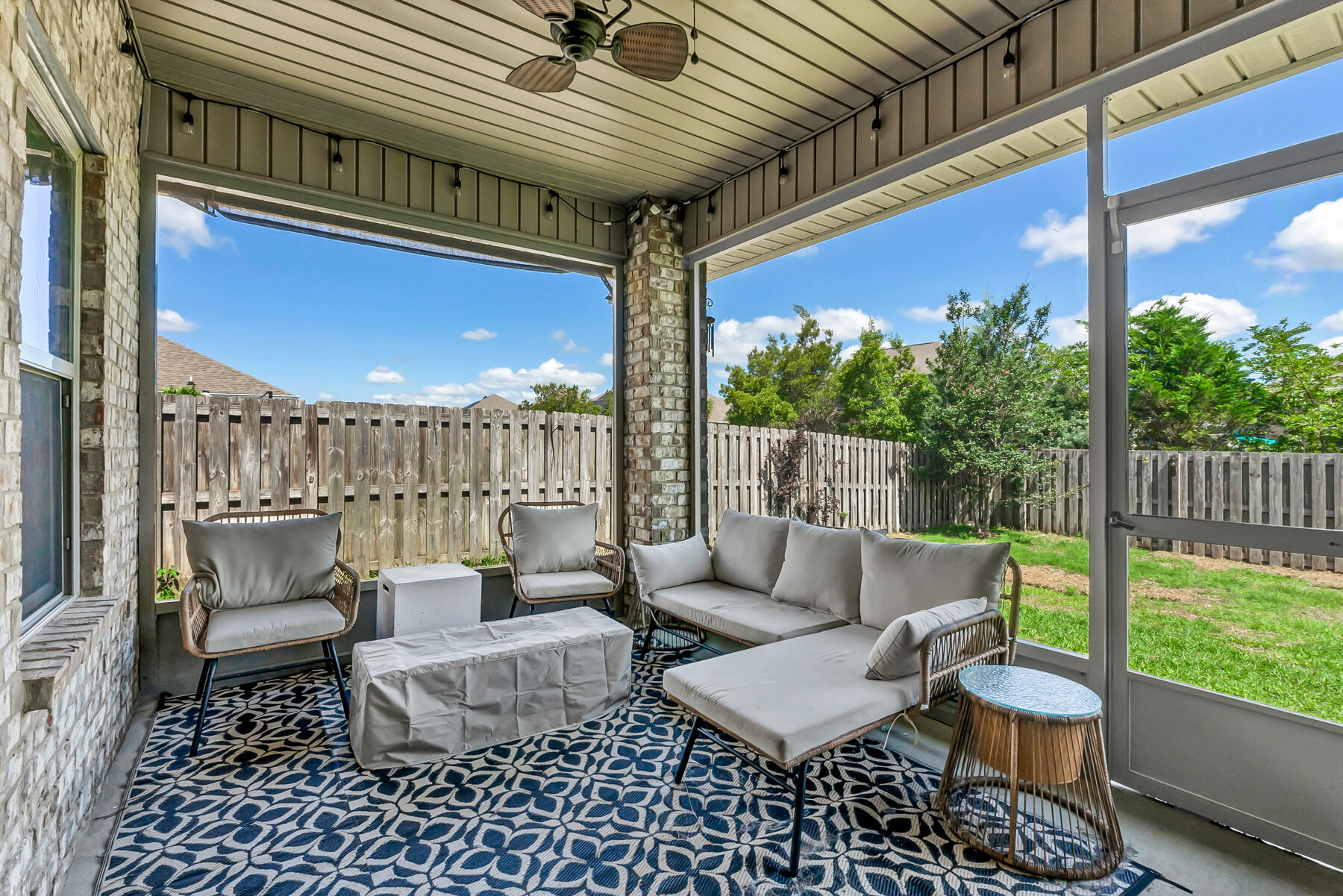 682 Teal Street Crestview, FL 32539 - Photo 32 of 34 a outdoor space with patio the couches and a potted plant on coffee table with outer view