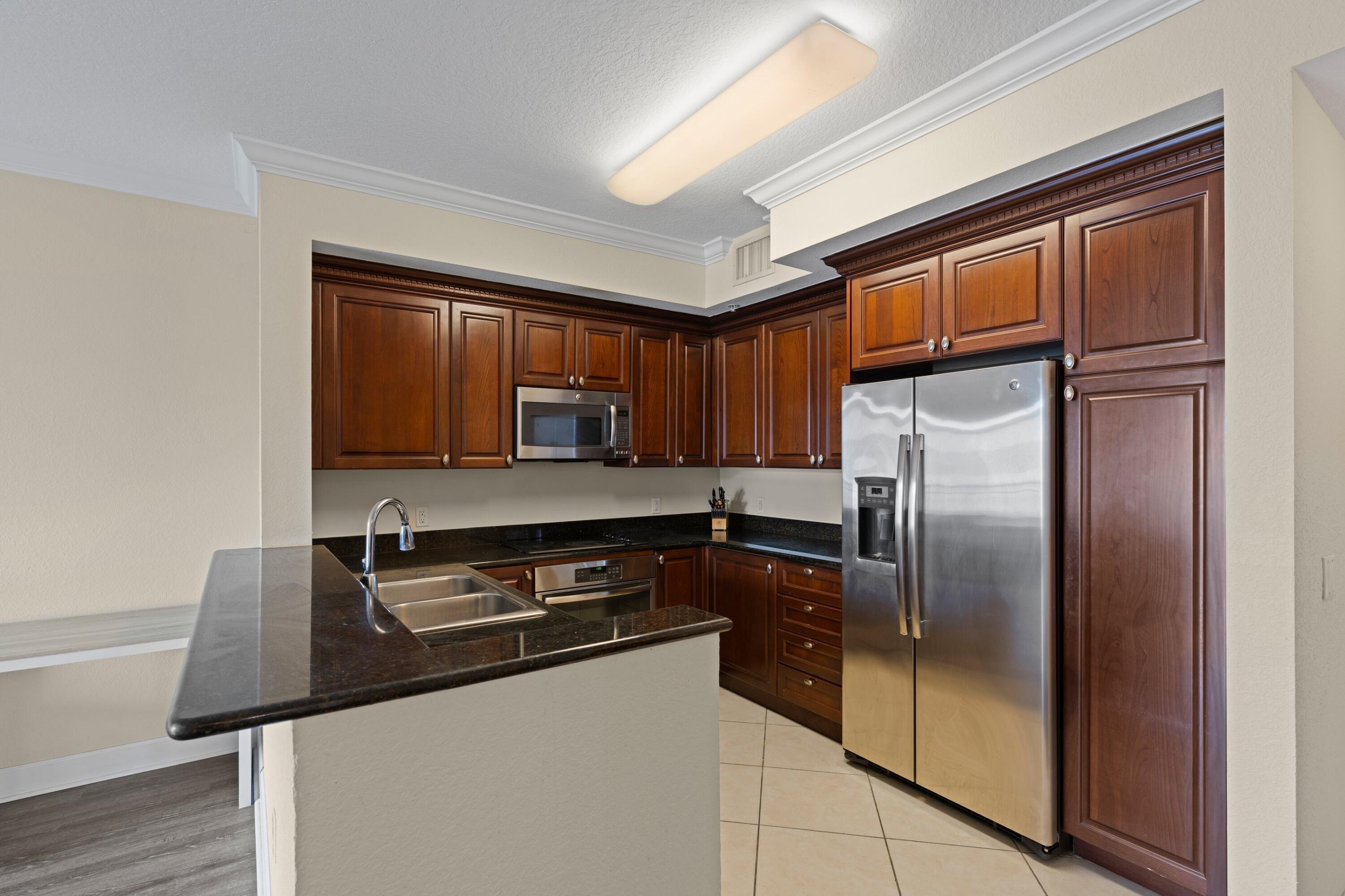 1660 Renaissance Commons Boulevard, Unit 2629 Boynton Beach, FL 33426 - Photo 8 of 25 Kitchen