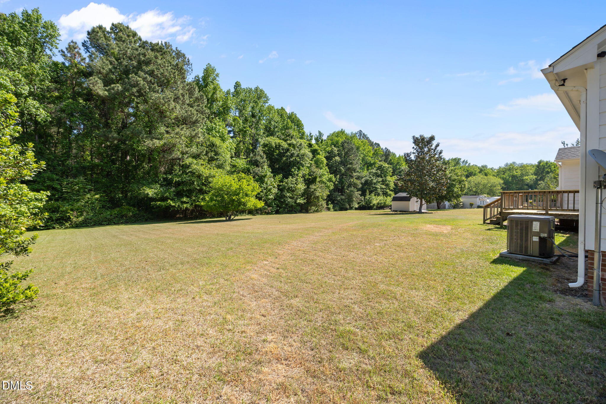 40 Circle Tree Lane Angier, NC 27501 - Photo 37 of 39 a view of a lake with a yard