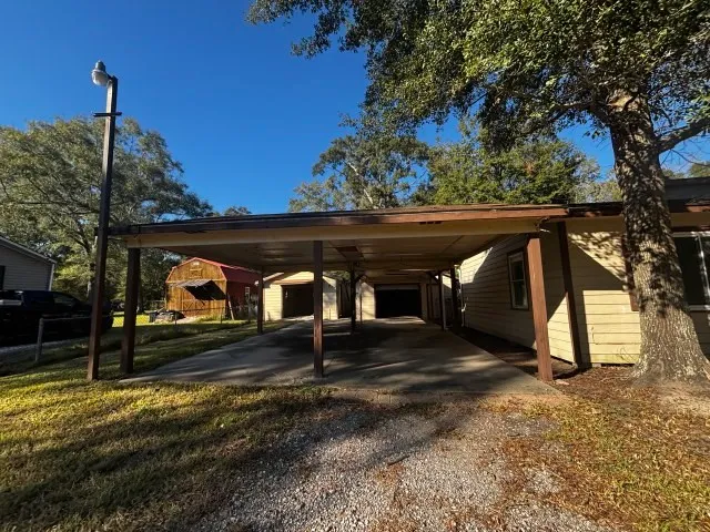 a view of a house with brick walls