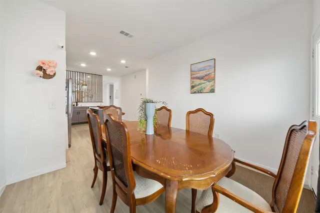 a view of a dining room with furniture