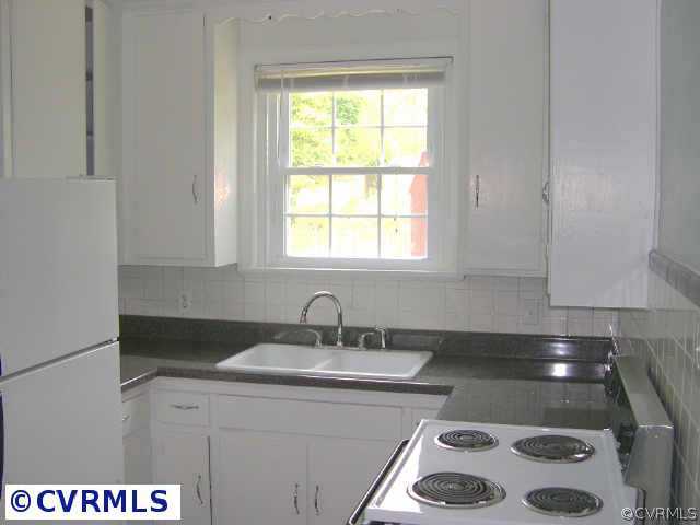 6402 Club Road Richmond, VA 23228 - Photo 4 of 8 Other - Kitchen features new countertops, new flooring, area for a small table