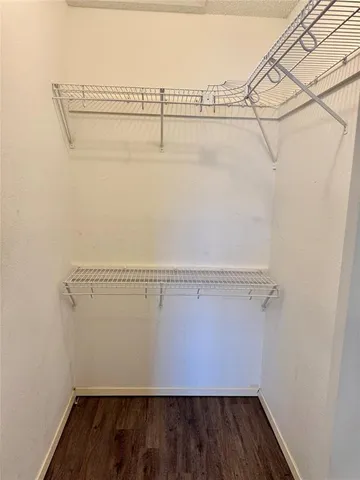 a view of a room with racks on the wall