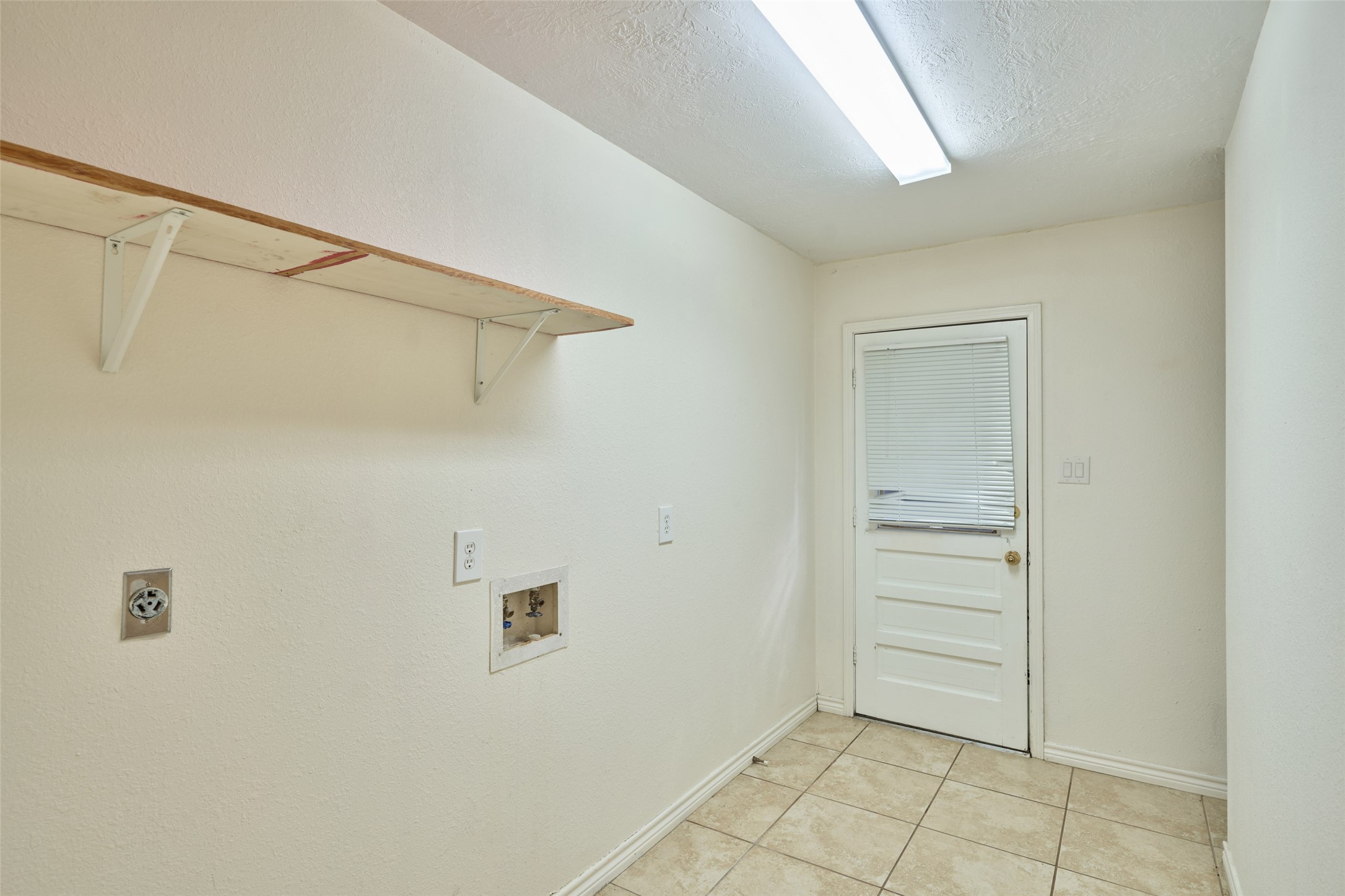 11616 Timberwild Street Spring, TX 77380 - Photo 21 of 50 Laundry/Utility Room