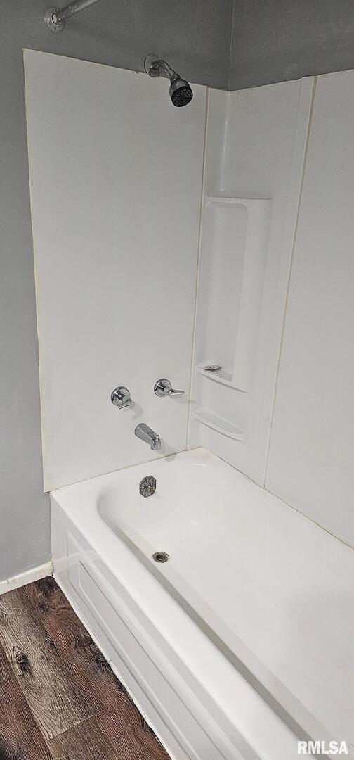 2515 North 3rd Street Clinton, IA 52732 - Photo 11 of 21 a bathroom with a bathtub and shower