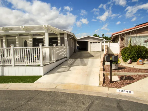 a house view with a backyard space