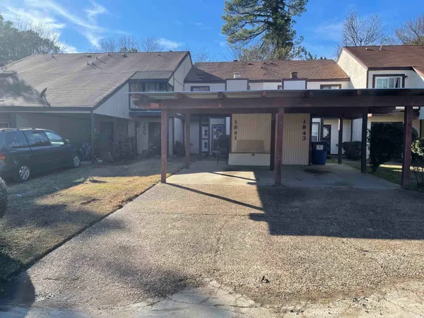 a view of a house with a patio