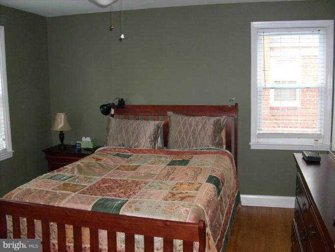 1741 Glen Ridge Road Parkville, MD 21286 - Photo 20 of 30 a bedroom with a bed and window