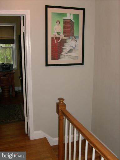 1741 Glen Ridge Road Parkville, MD 21286 - Photo 25 of 30 a view of a hallway with a wooden floor