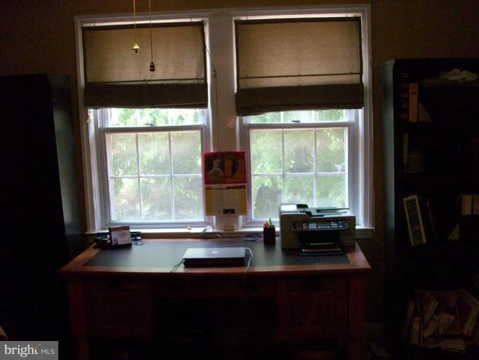 1741 Glen Ridge Road Parkville, MD 21286 - Photo 29 of 30 a room with a large window and table