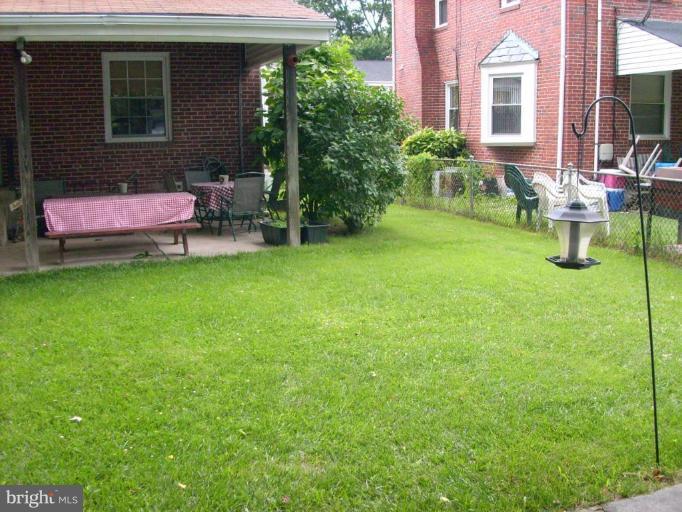 1741 Glen Ridge Road Parkville, MD 21286 - Photo 5 of 30 a backyard of a house with seating space
