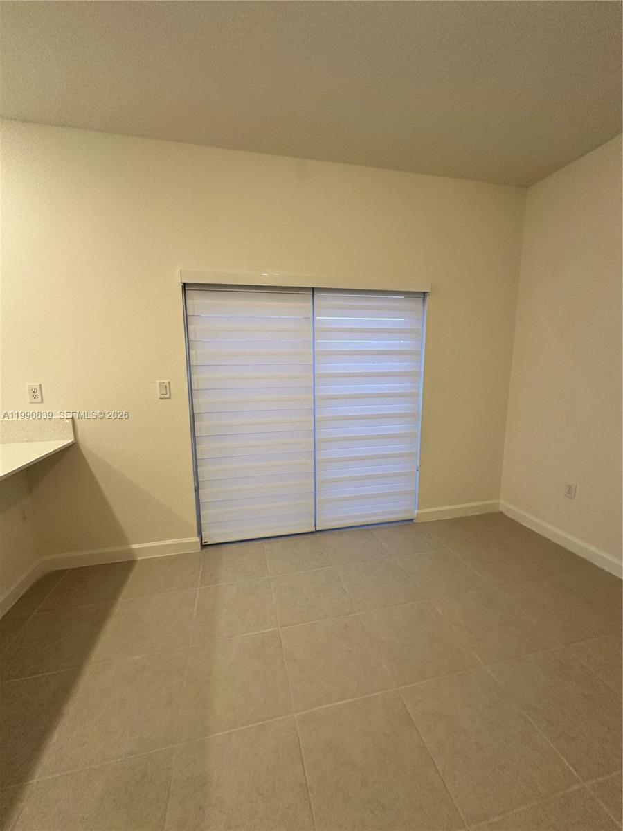2889 Southeast 25rd, Unit 2889 Homestead, FL 33035 - Photo 16 of 23 a view of an empty room