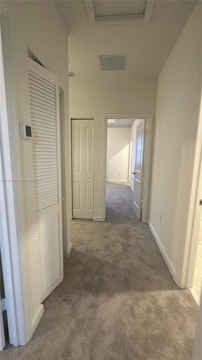 2889 Southeast 25rd, Unit 2889 Homestead, FL 33035 - Photo 20 of 23 an empty room with windows