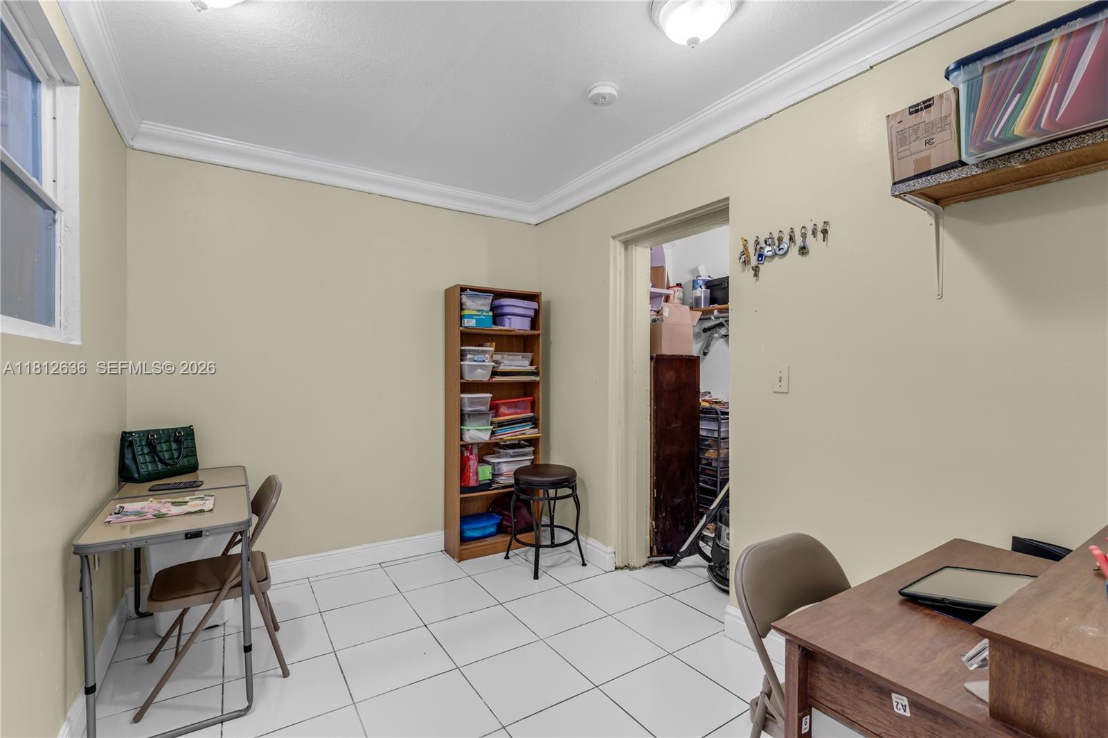 18820 Southwest 316th Street Homestead, FL 33030 - Photo 14 of 43 a work room with furniture