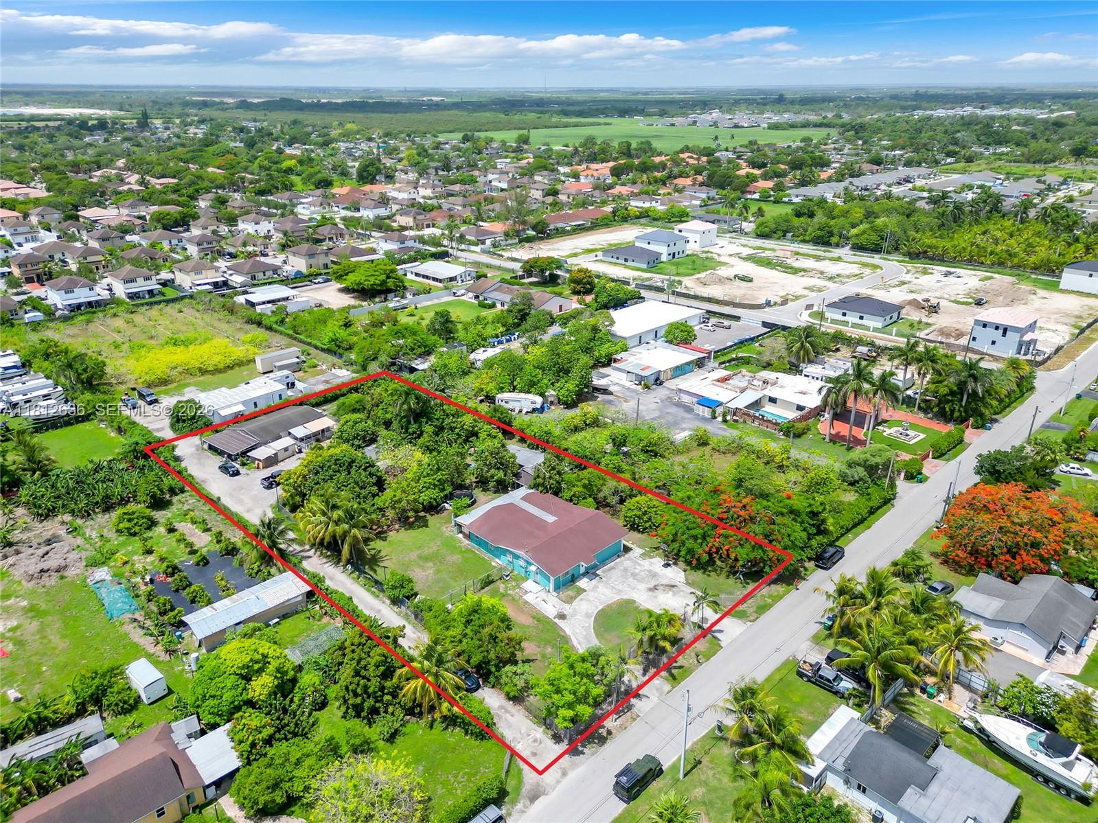 18820 Southwest 316th Street Homestead, FL 33030 - Photo 2 of 43 view of city and green space