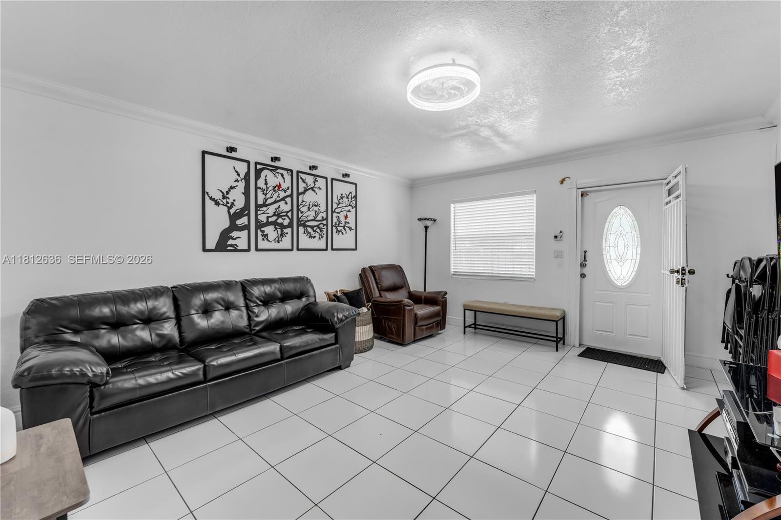 18820 Southwest 316th Street Homestead, FL 33030 - Photo 4 of 43 a living room with furniture