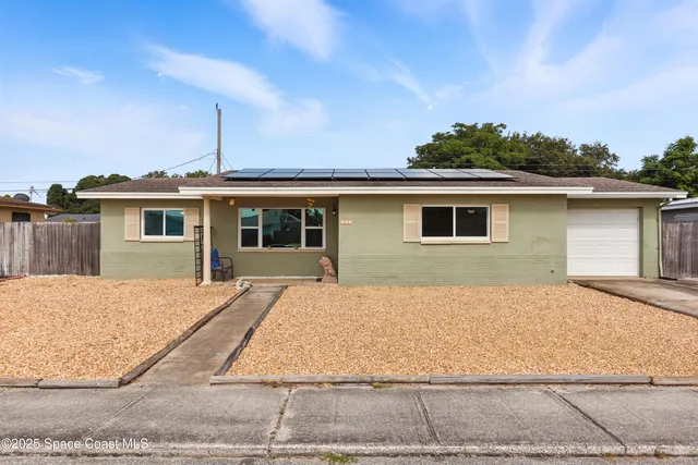 front view of house with a yard