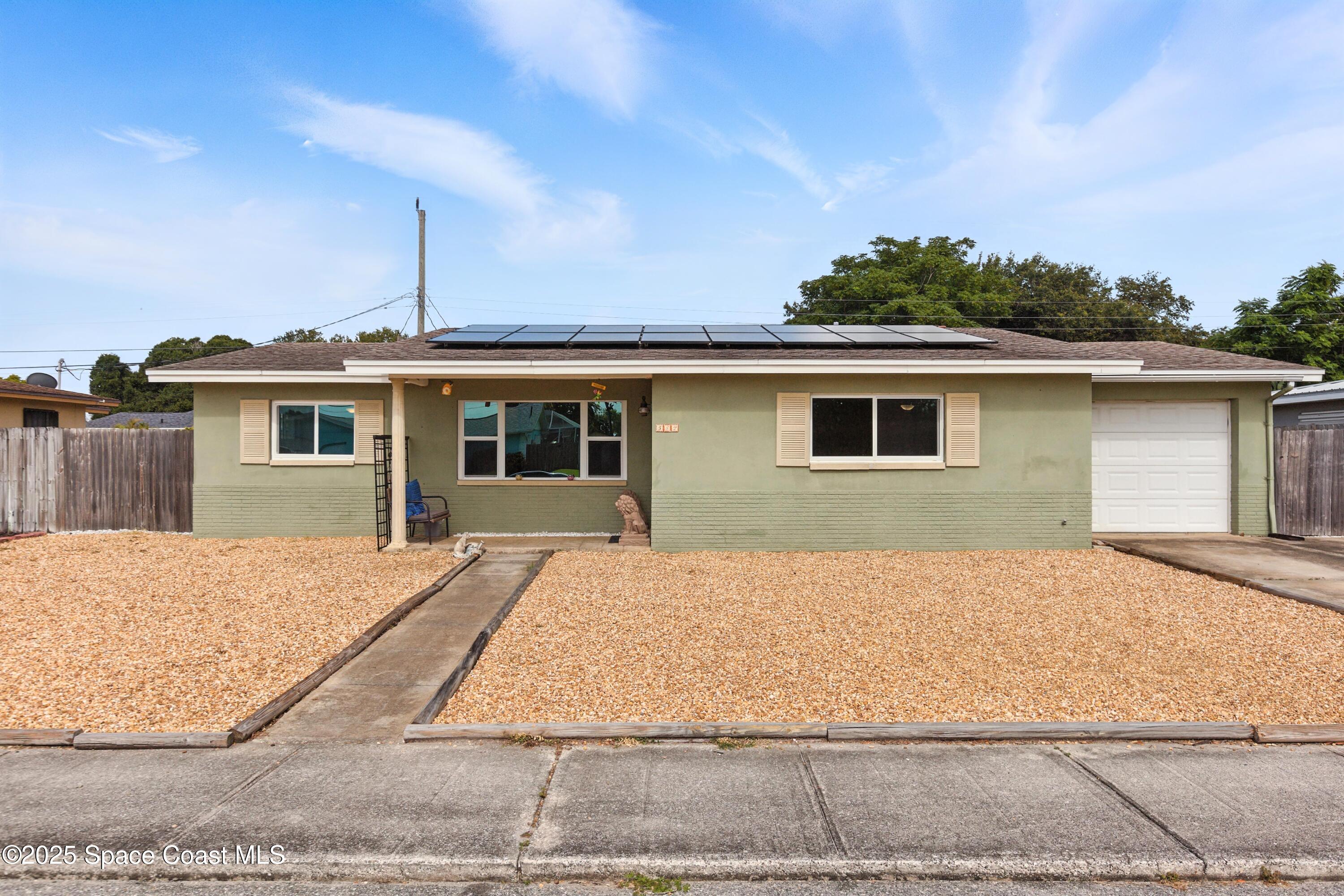 front view of house with a yard