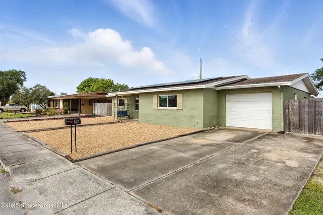 a house view with a outdoor space