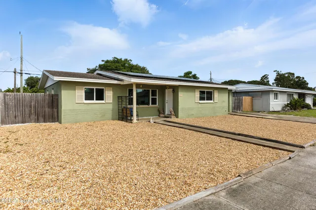 front view of house with a yard