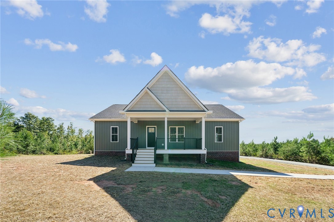 Lot 1 Oak Hill Road Cumberland, VA 23040 - Photo 2 of 26 a front view of a house with a yard