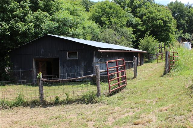 5323 Wiley Hollow Road Culleoka, TN 38451 - Photo 19 of 20 This barn is the small stock barn which has a shop area, 3 stalls, tack room with a hay loft, along with 3 corrals surrounding the barn.