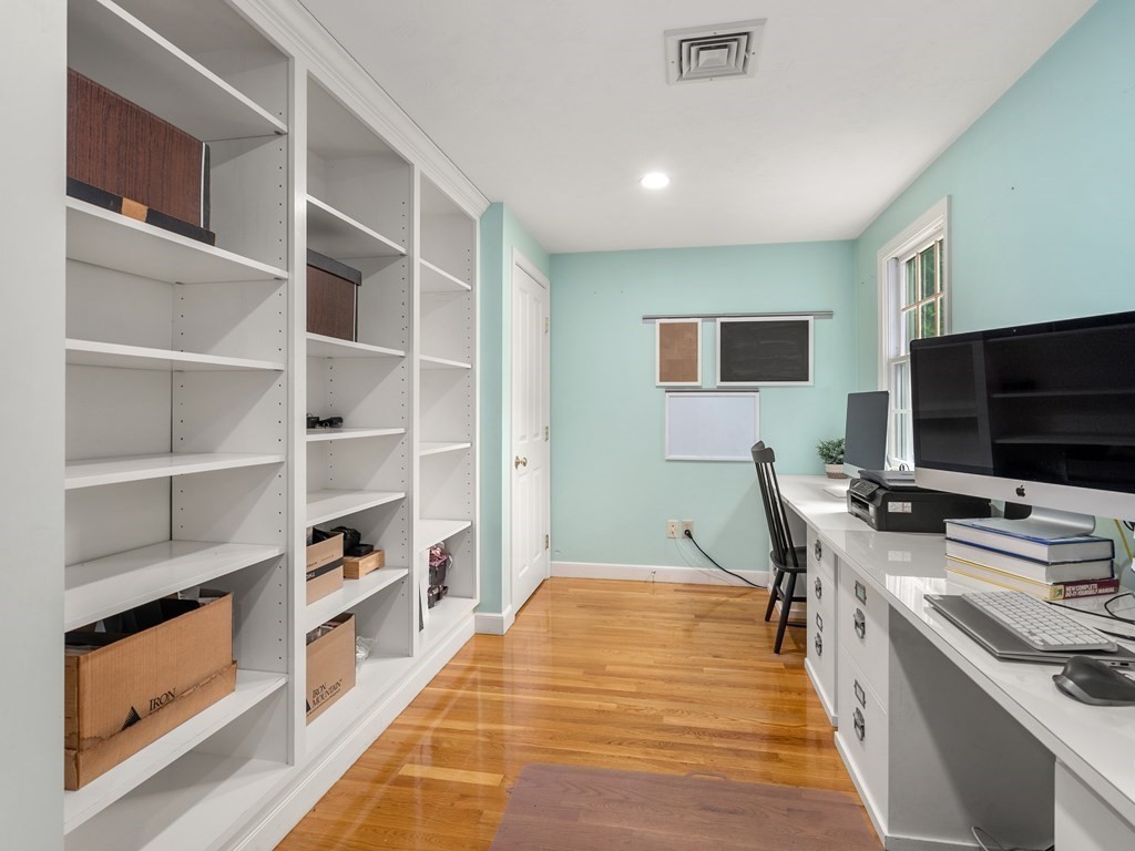 123 Victoria Road Sudbury, MA 01776 - Photo 18 of 42 a room with furniture a flat screen tv and a view of kitchen