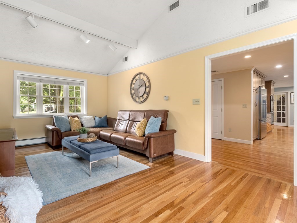 123 Victoria Road Sudbury, MA 01776 - Photo 21 of 42 a living room with furniture and a large window