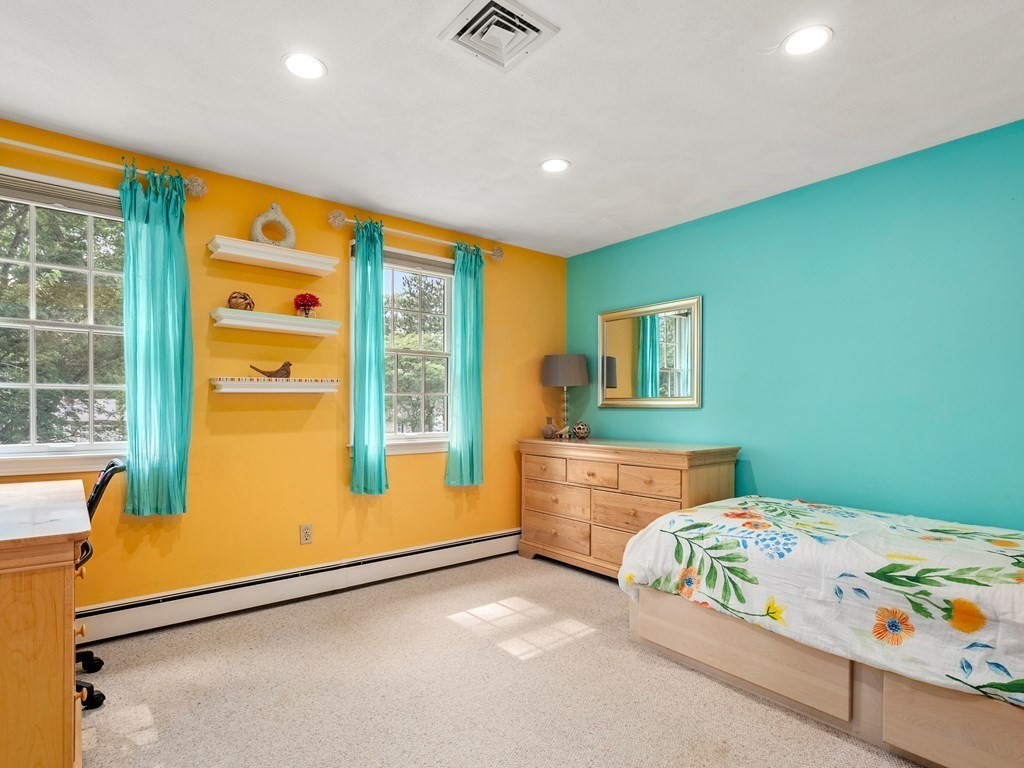 123 Victoria Road Sudbury, MA 01776 - Photo 29 of 42 a bedroom with a bed and a window