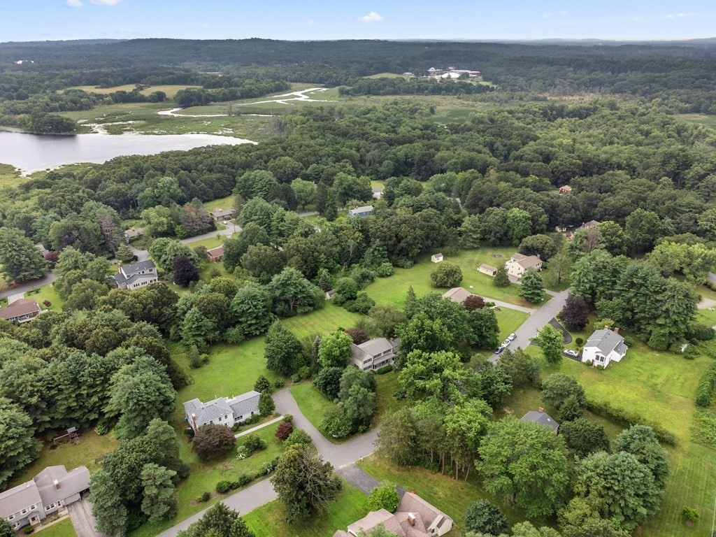 123 Victoria Road Sudbury, MA 01776 - Photo 35 of 42 an aerial view of green landscape with trees houses and mountain view