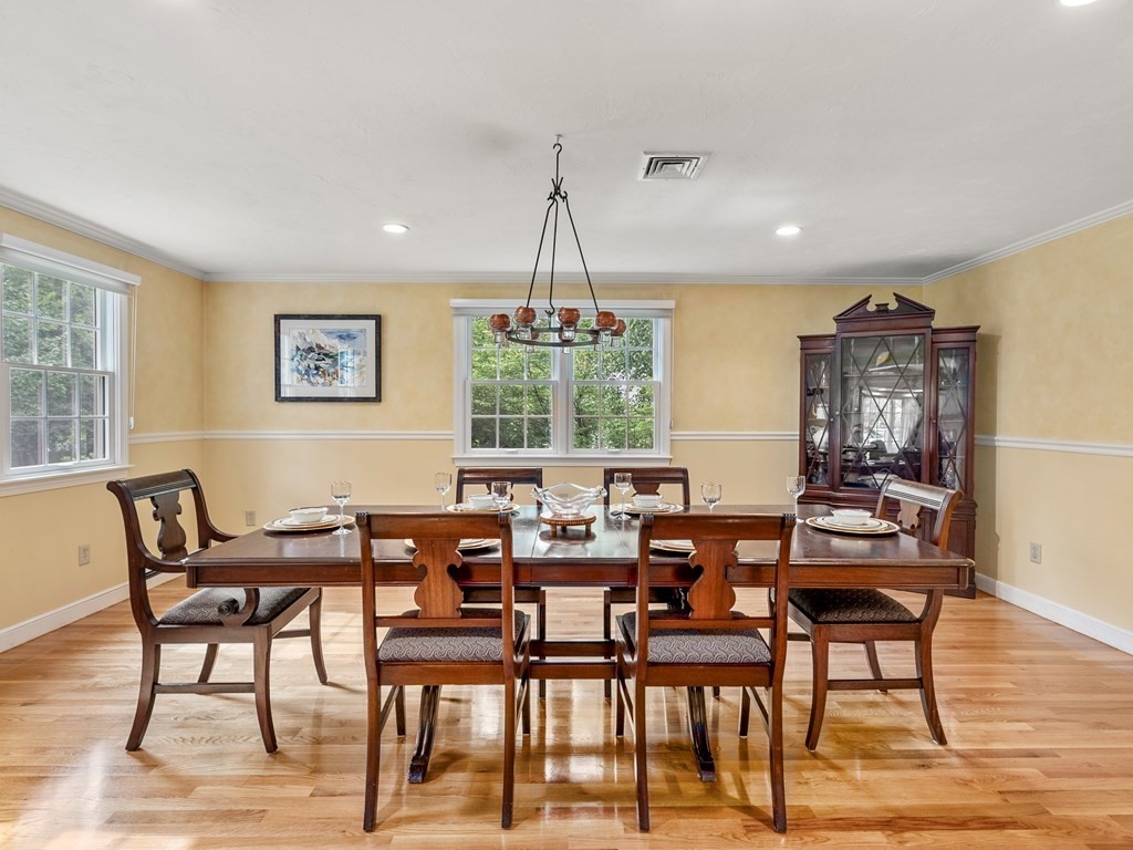 123 Victoria Road Sudbury, MA 01776 - Photo 8 of 42 a view of a dining room with furniture window and wooden floor