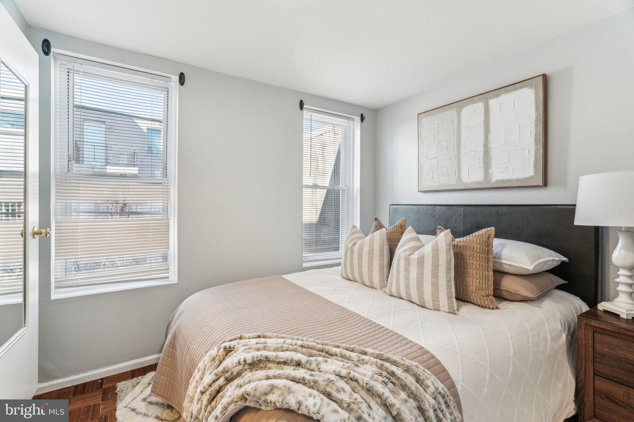 1314 South Warnock Street Philadelphia, PA 19147 - Photo 15 of 24 a bedroom with a bed and a window