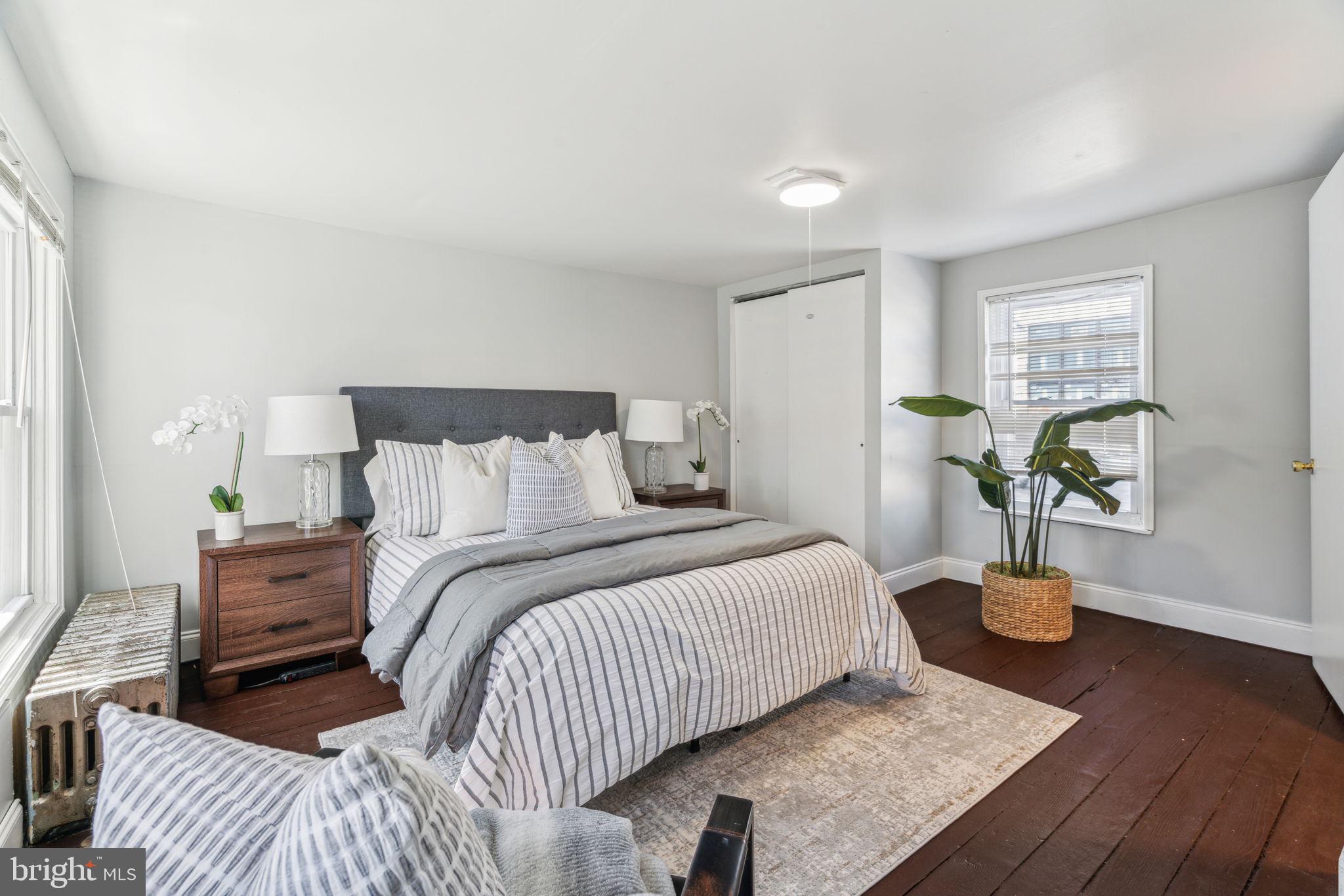 1314 South Warnock Street Philadelphia, PA 19147 - Photo 21 of 24 a bedroom with a bed and window