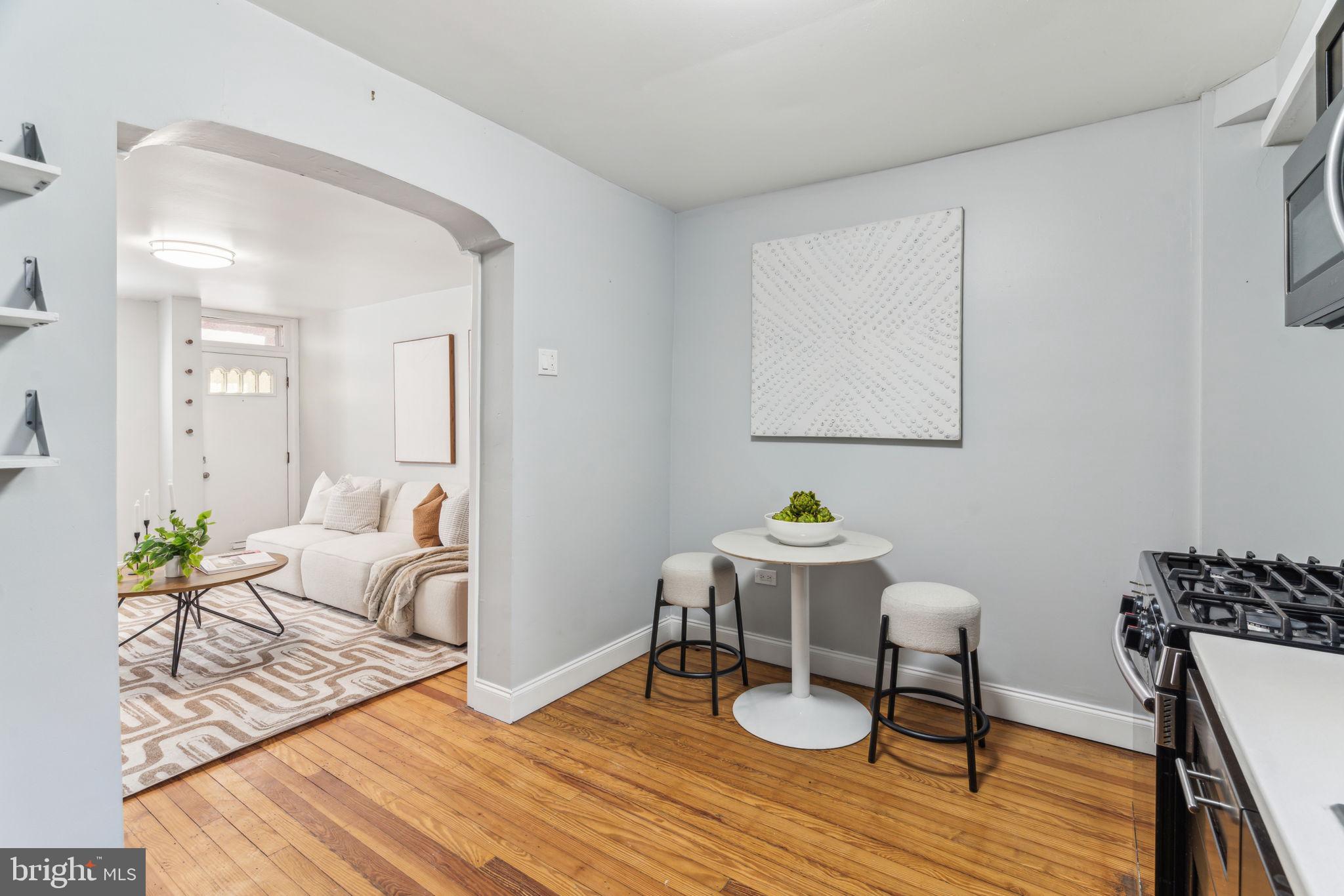 1314 South Warnock Street Philadelphia, PA 19147 - Photo 5 of 24 a living room with furniture and wooden floor