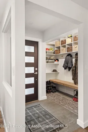 a bedroom with a bed and a closet