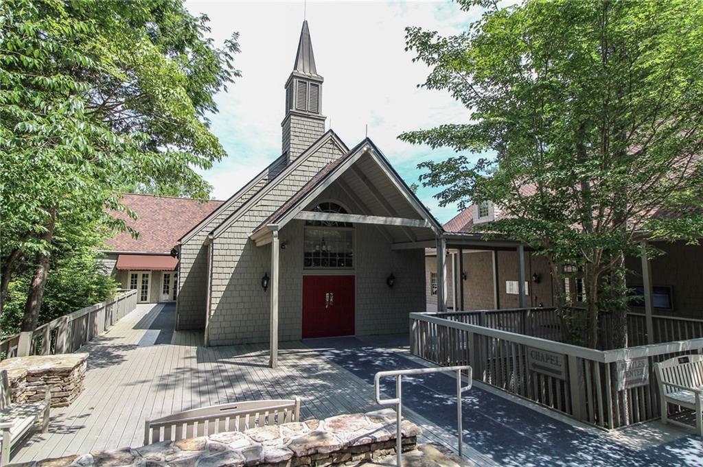 8088 Ridgeview Drive Big Canoe, GA 30143 - Photo 25 of 30 a view of house with outdoor seating area