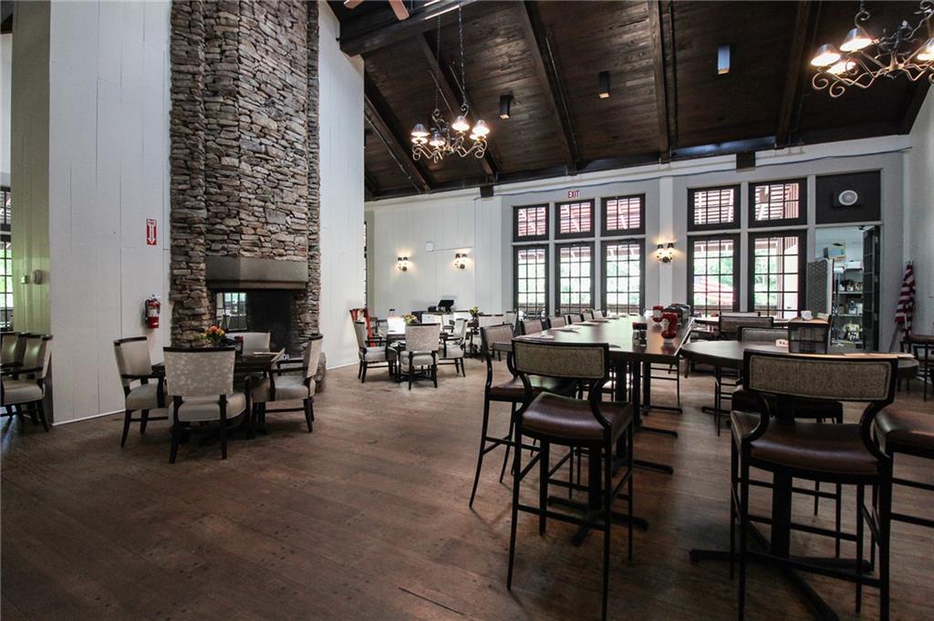 8088 Ridgeview Drive Big Canoe, GA 30143 - Photo 26 of 30 a view of a dining room with furniture and chandelier