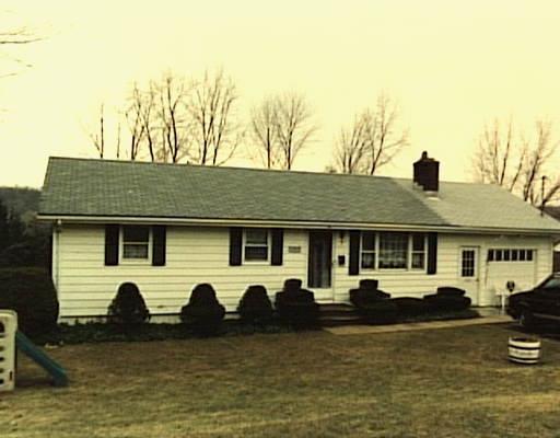 14 High View Road New Milford, CT 06776 - Photo 1 of 1 a front view of a house with swimming pool